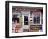 Idaho, Usa; Signs on an Old Gas Station in the American Midwest-Dan Bannister-Framed Premium Photographic Print