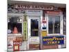 Idaho, Usa; Signs on an Old Gas Station in the American Midwest-Dan Bannister-Mounted Photographic Print