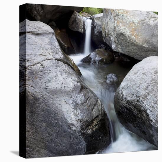 Idaho, USA. Squaw Creek waterfall detail with boulders.-Brent Bergherm-Stretched Canvas