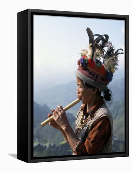 Ifugao Person Playing a Pipe, Northern Area, Island of Luzon, Philippines, Southeast Asia-Bruno Barbier-Framed Stretched Canvas