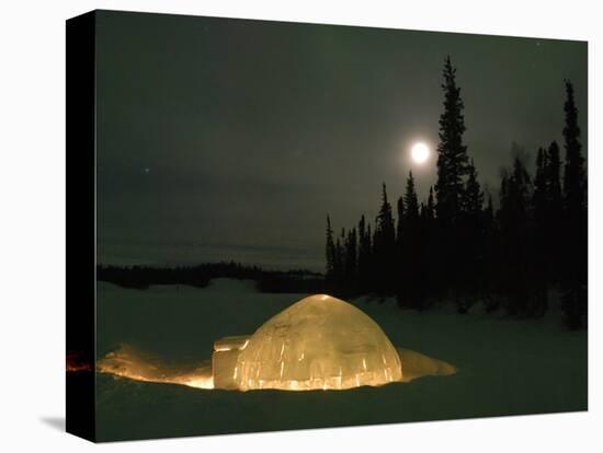 Igloo with Lights at Night by Moonlight, Northwest Territories, Canada March 2007-Eric Baccega-Stretched Canvas