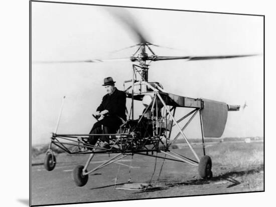 Igor Sikorsky at the Controls of the VS-300 Helicopter-null-Mounted Photo