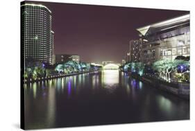Illuminated architecture and reflections at night in Hangzhou City Center, Hangzhou, Zhejiang, Chin-Andreas Brandl-Stretched Canvas