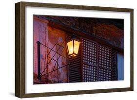 Illuminated vintage street lamp on wall, Calle Crisologo, Vigan, Ilocos Sur, Philippines-null-Framed Photographic Print