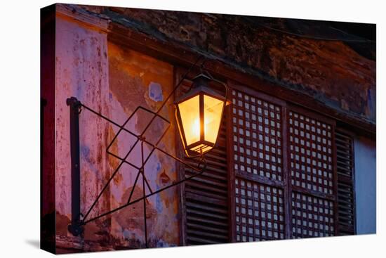 Illuminated vintage street lamp on wall, Calle Crisologo, Vigan, Ilocos Sur, Philippines-null-Stretched Canvas