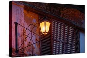 Illuminated vintage street lamp on wall, Calle Crisologo, Vigan, Ilocos Sur, Philippines-null-Stretched Canvas