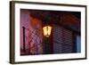 Illuminated vintage street lamp on wall, Calle Crisologo, Vigan, Ilocos Sur, Philippines-null-Framed Photographic Print