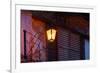 Illuminated vintage street lamp on wall, Calle Crisologo, Vigan, Ilocos Sur, Philippines-null-Framed Photographic Print