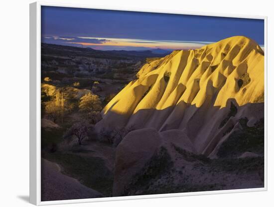 Illuminateded Tuff Stone Erosion with Uchisar, Cappadocia, Anatolia, Turkey-Rainer Mirau-Framed Photographic Print