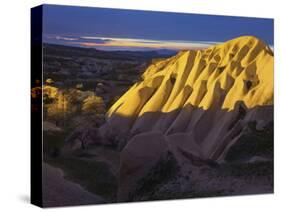 Illuminateded Tuff Stone Erosion with Uchisar, Cappadocia, Anatolia, Turkey-Rainer Mirau-Stretched Canvas