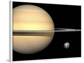 Illustration of Saturn and Earth to Scale-Stocktrek Images-Framed Photographic Print