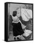 Illustration of Woman Hanging Up Clothes to Dry on Clothes Line-null-Framed Stretched Canvas