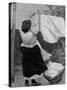 Illustration of Woman Hanging Up Clothes to Dry on Clothes Line-null-Stretched Canvas