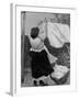 Illustration of Woman Hanging Up Clothes to Dry on Clothes Line-null-Framed Photographic Print
