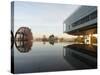 Image of the Clinton Library Building and an Old Bridge Reflected in a Pool-null-Stretched Canvas