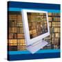 Images of Book Shelves on Computer Screen-null-Stretched Canvas