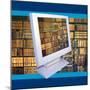 Images of Book Shelves on Computer Screen-null-Mounted Photographic Print