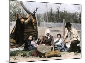 Immigrant Family Cutting Seed Potatoes to Plant on Their Quarter-Acre in Michigan, 1890s-null-Mounted Giclee Print