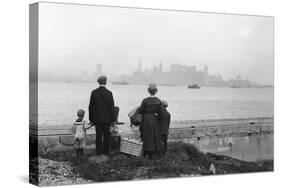 Immigrant Family Looking at New York Skyline-null-Stretched Canvas