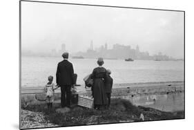 Immigrant Family Looking at New York Skyline-null-Mounted Photographic Print