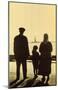 Immigrant Family Looking At Statue Of Liberty From Ellis Island-null-Mounted Poster
