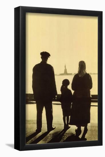 Immigrant Family Looking At Statue Of Liberty From Ellis Island-null-Framed Poster