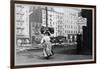 Immigrant Woman Walks Down Street Carrying a Pile of Clothing on Her Head-null-Framed Art Print