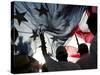 Immigration Rights Demonstrators Hold a U.S. Flag Aloft During a March Along Wilshire Boulevard-null-Stretched Canvas