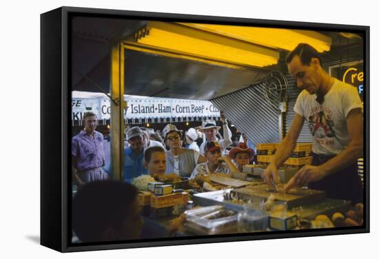 In a Booth at the Iowa State Fair, a Man Demonstrates 'Feemsters Famous Vegetable Slicer', 1955-John Dominis-Framed Stretched Canvas