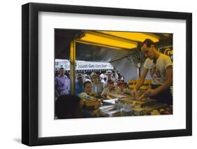In a Booth at the Iowa State Fair, a Man Demonstrates 'Feemsters Famous Vegetable Slicer', 1955-John Dominis-Framed Photographic Print