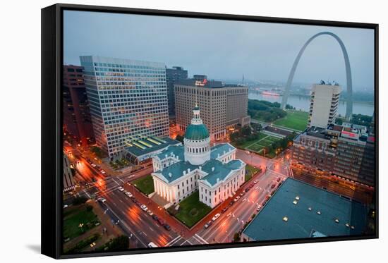 In a misty rain an elevated view of Gateway Arch and the historical Old St. Louis Courthouse. Th...-null-Framed Stretched Canvas