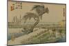 In a Storm a Man Runs Behind His Hat While Another Man Crosses the River-Utagawa Hiroshige-Mounted Art Print