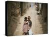 In an Alley While Waiting for the Rest of their Friends in a Poor Neighborhood in Pakistan-null-Stretched Canvas