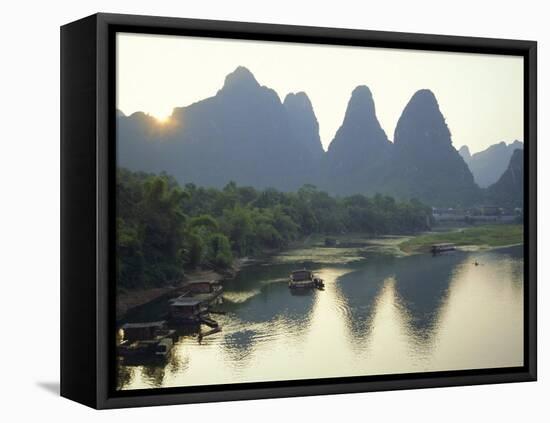 In Guilin Limestone Tower Hills Rise Steeply Above the Li River, Yangshuo, Guangxi Province, China-Anthony Waltham-Framed Stretched Canvas