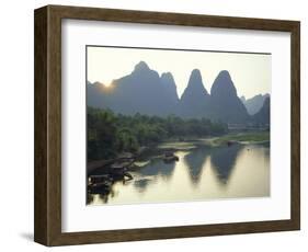 In Guilin Limestone Tower Hills Rise Steeply Above the Li River, Yangshuo, Guangxi Province, China-Anthony Waltham-Framed Photographic Print