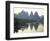 In Guilin Limestone Tower Hills Rise Steeply Above the Li River, Yangshuo, Guangxi Province, China-Anthony Waltham-Framed Photographic Print