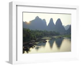 In Guilin Limestone Tower Hills Rise Steeply Above the Li River, Yangshuo, Guangxi Province, China-Anthony Waltham-Framed Photographic Print