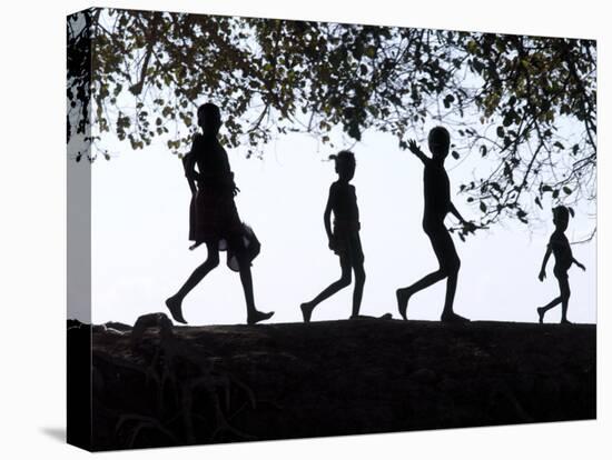 In Late Afternoon, a Group of Dassanech Children Walk Along Bank of Omo River in Southwest Ethiopia-Nigel Pavitt-Stretched Canvas