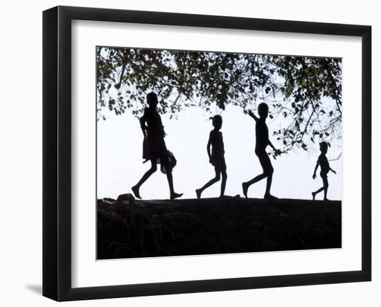 In Late Afternoon, a Group of Dassanech Children Walk Along Bank of Omo River in Southwest Ethiopia-Nigel Pavitt-Framed Photographic Print