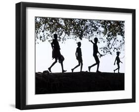 In Late Afternoon, a Group of Dassanech Children Walk Along Bank of Omo River in Southwest Ethiopia-Nigel Pavitt-Framed Photographic Print