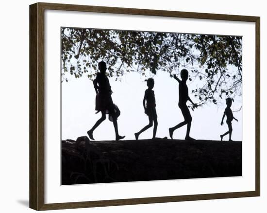 In Late Afternoon, a Group of Dassanech Children Walk Along Bank of Omo River in Southwest Ethiopia-Nigel Pavitt-Framed Photographic Print