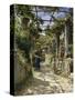 In the Shadow of an Italian Pergola, A Warm Afternoon in Anacapri-Peder Mork Monsted-Stretched Canvas