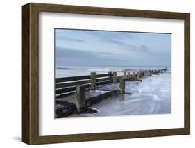 Incoming waves hitting a groyne at Walcott, Norfolk, England, United Kingdom, Europe-Jon Gibbs-Framed Photographic Print