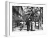 Incredibly Well Dressed Man, Woman and Child Walking by Perfect Brownstone Apartment Buildings-George B^ Brainerd-Framed Photographic Print