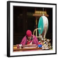 India, Ladakh, Hemis, Monk Reciting Prayers to the Slow Rhythm of a Drum at Hemis Monastery-Katie Garrod-Framed Photographic Print