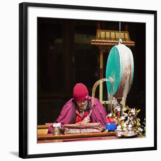 India, Ladakh, Hemis, Monk Reciting Prayers to the Slow Rhythm of a Drum at Hemis Monastery-Katie Garrod-Framed Photographic Print