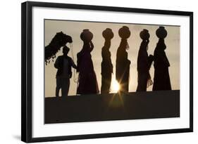 India, Manvar, Desert, Sand Dunes. Colorfully Dressed Women Walking with Pots on their Head-Emily Wilson-Framed Photographic Print