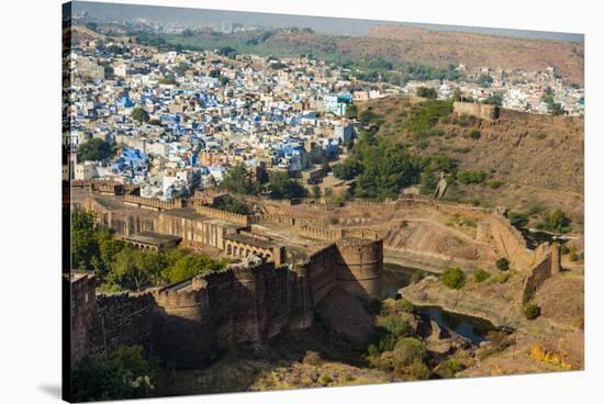 India, Rajasthan, Jodhpur. Mehrangarh Fort, view from tower of old city wall and houses beyond pain-Alison Jones-Stretched Canvas