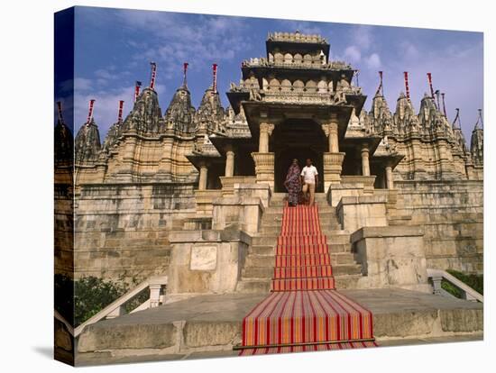 India, Rajasthan, Ranakpur, a Couple Descend Steps at the Famous Chaumukha Mandir, an Elaborately S-Amar Grover-Stretched Canvas