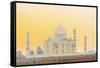 India, Uttar Pradesh, Agra, Taj Mahal in Golden Dawn Light-Alex Robinson-Framed Stretched Canvas